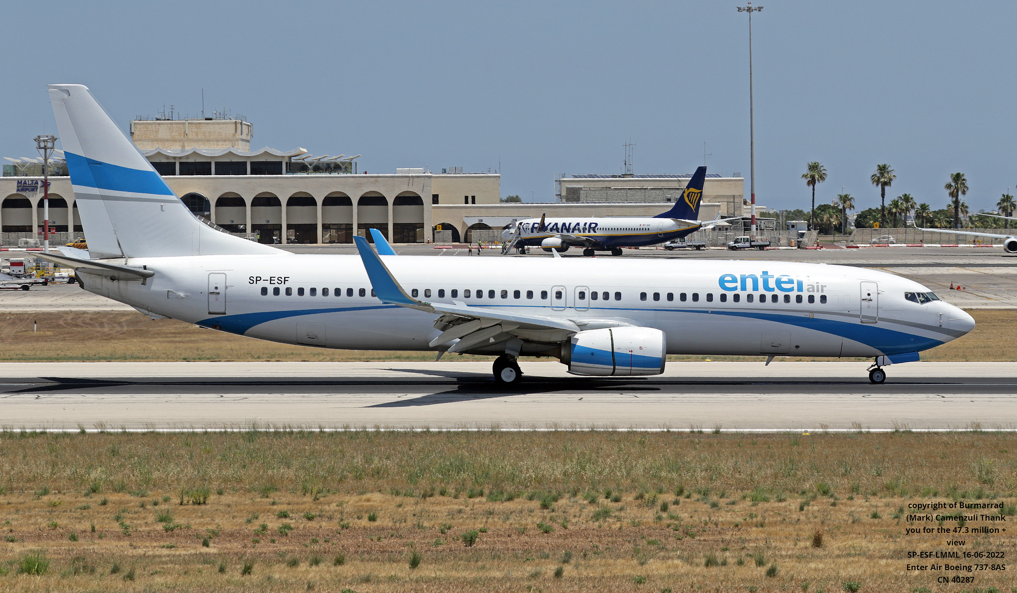 Enter Aircraft on the runway, white aircraft in few blue stripes