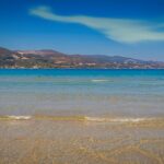 Quiet beach in Zakynthos, with blue waters and blue skies.