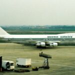 A Nigeria Airways Boeing 747-200 is seen on the apron at an international airport during the airline’s operational years. The iconic jumbo jet was a key part of the flag carrier’s long-haul fleet before the airline ceased operations in 2003.