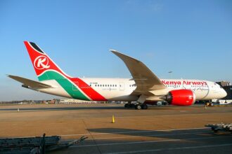 The aircraft pictured is a Boeing 777-200ER belonging to Kenya Airways, the flag carrier of Kenya.