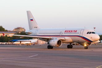 An Rossiya airline Airbus A319-111 in the evening light ready to take flight to Pulkovo