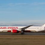 Air India Boeing 787 Dreamliner parked on the runway at dawn