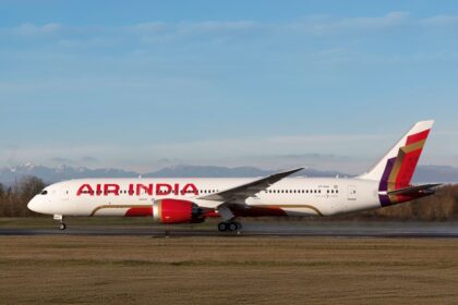 Air India Boeing 787 Dreamliner parked on the runway at dawn