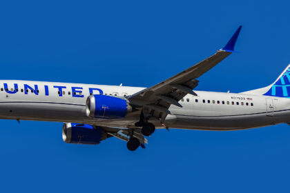 United Airlines Boeing 737 MAX 9 flying in clear blue skies