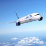 United Airlines Boeing 787- Dreamliner flying through a clear blue sky