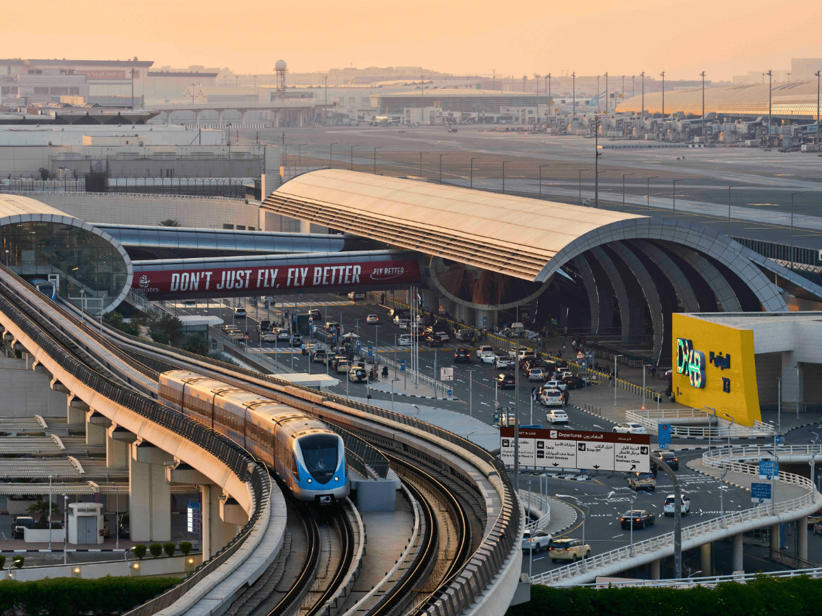 DXB Airport showing train and passenger terminals