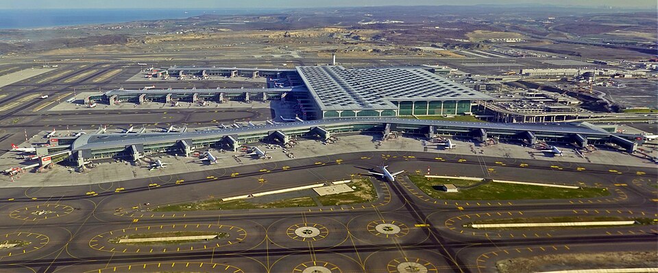 Istanbul Airport aerial view. Runways, aprons and aircraft in view. The sea in the background left.