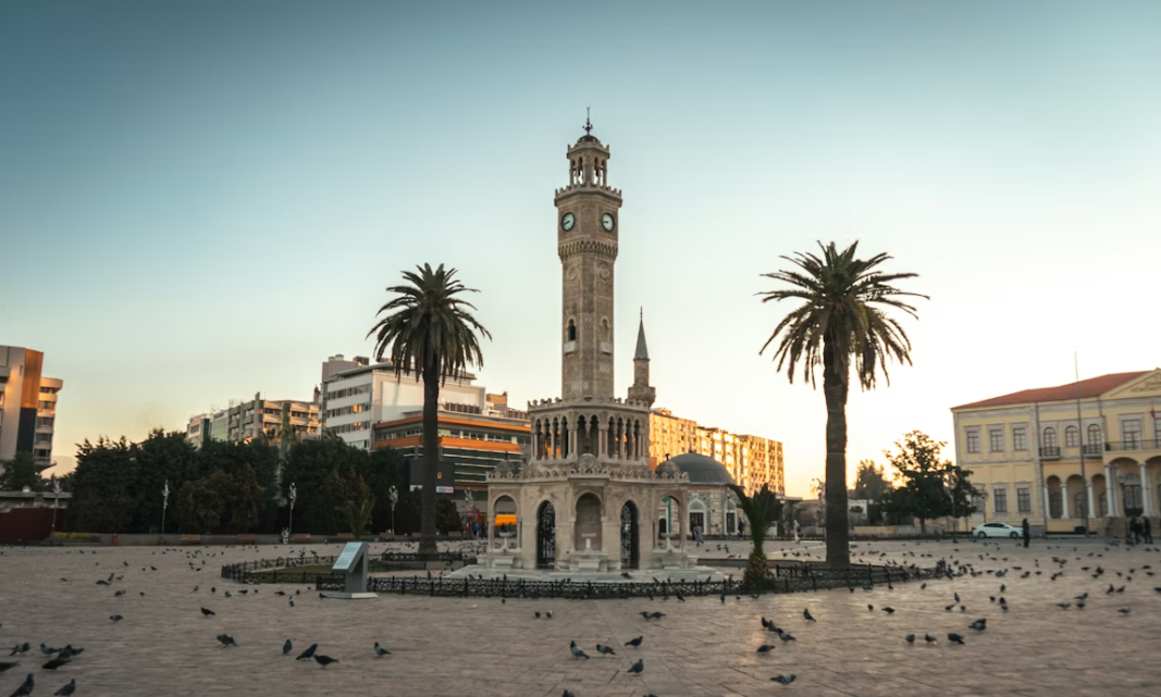 A large clock tower towering over a city