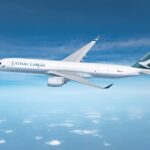 Rendered Cathay Cargo A350F flying against a blue sky with a dusting of clouds