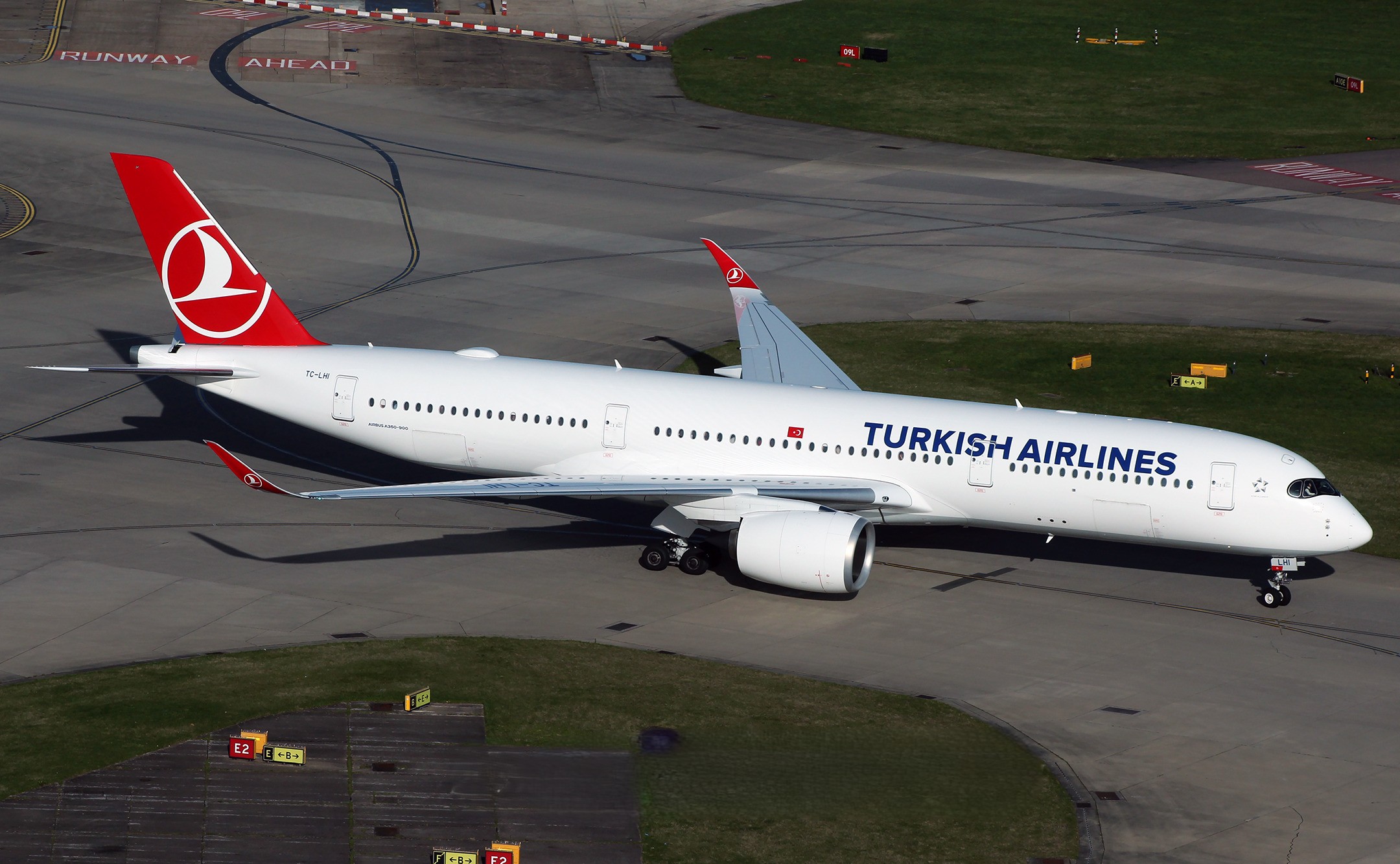Turkish Airlines Airbus A350-900 TC-LHI in standard livery photographed from above on airport taxiway.