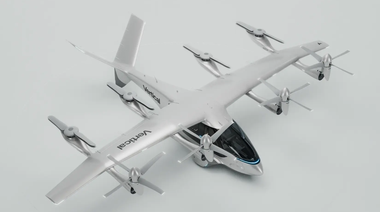 The Vertical Aerospace Valo prototype from an above-angle, the aircraft facing towards the right. Against a white backdrop. "Vertical" written in black on the wings.