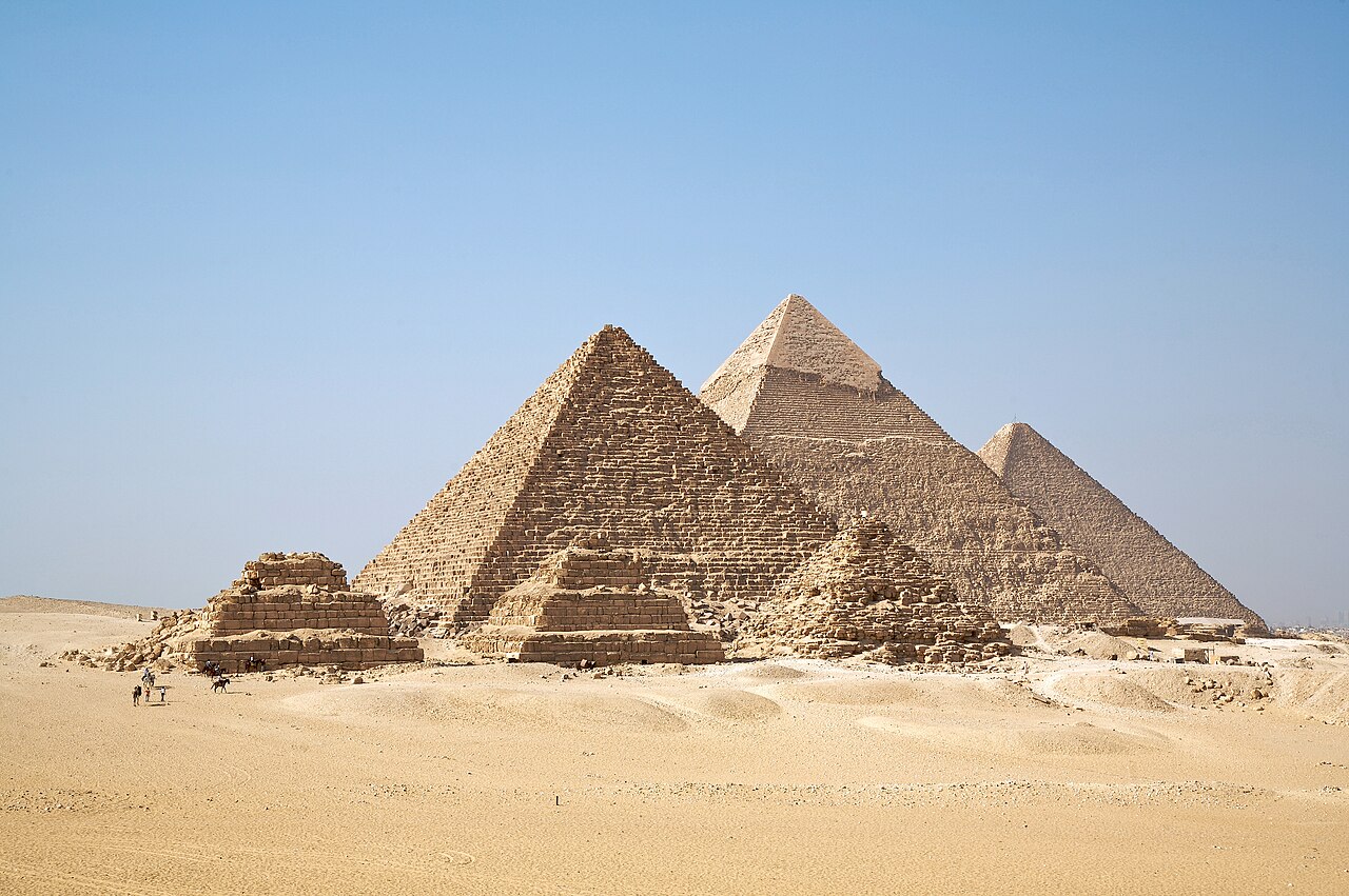 The Pyramids of Giza seen with the desert in the foreground