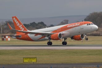 Easy Jet A320 G-EZON, with landing gear extended.