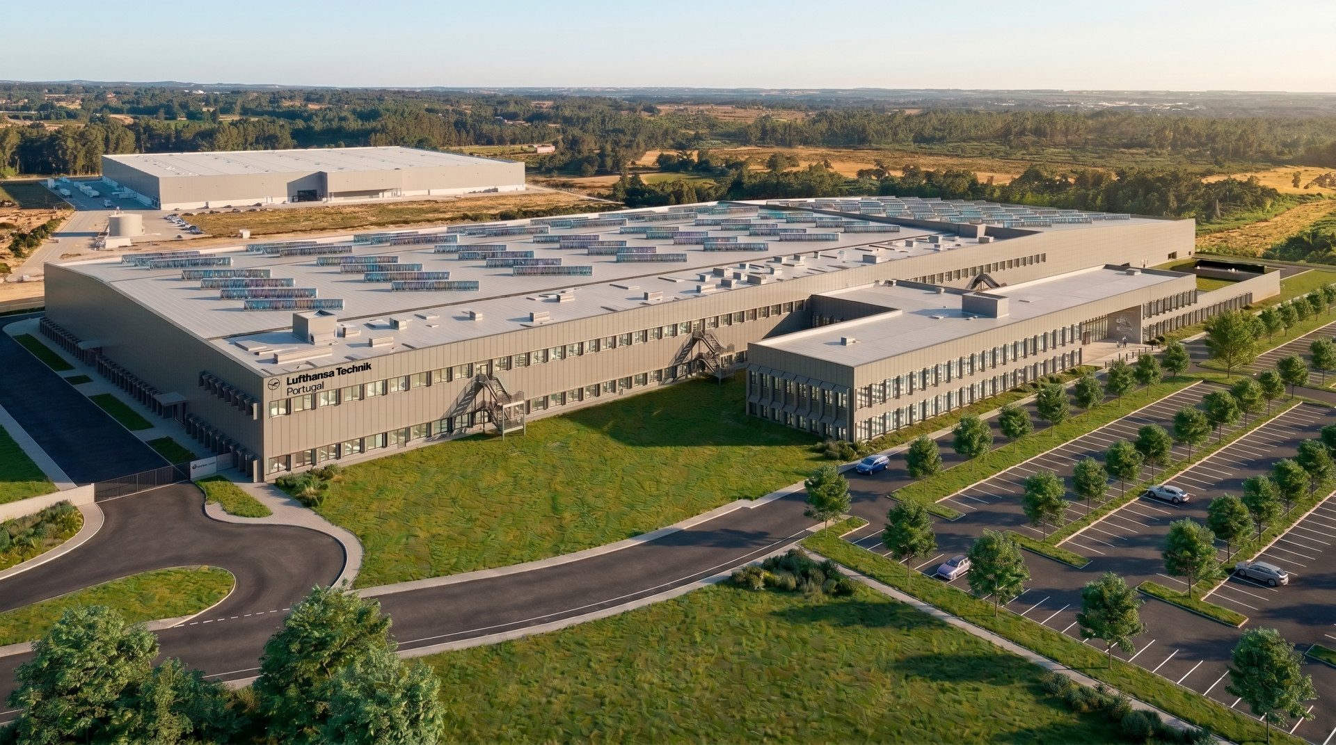 Rendering model of the facility in Portugal featuring Lufthansa Tecknik logo on the front of the building and a car park