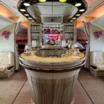 Interior of the Emirates A380 Onboard Lounge decorated for passenger service