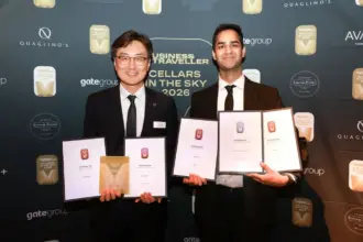 Two Korean Air representatives with their awards at the 2026 Cellars in the Sky Awards.