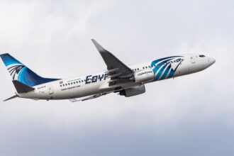 EgyptAir Boeing 737 ascending in a cloudy sky