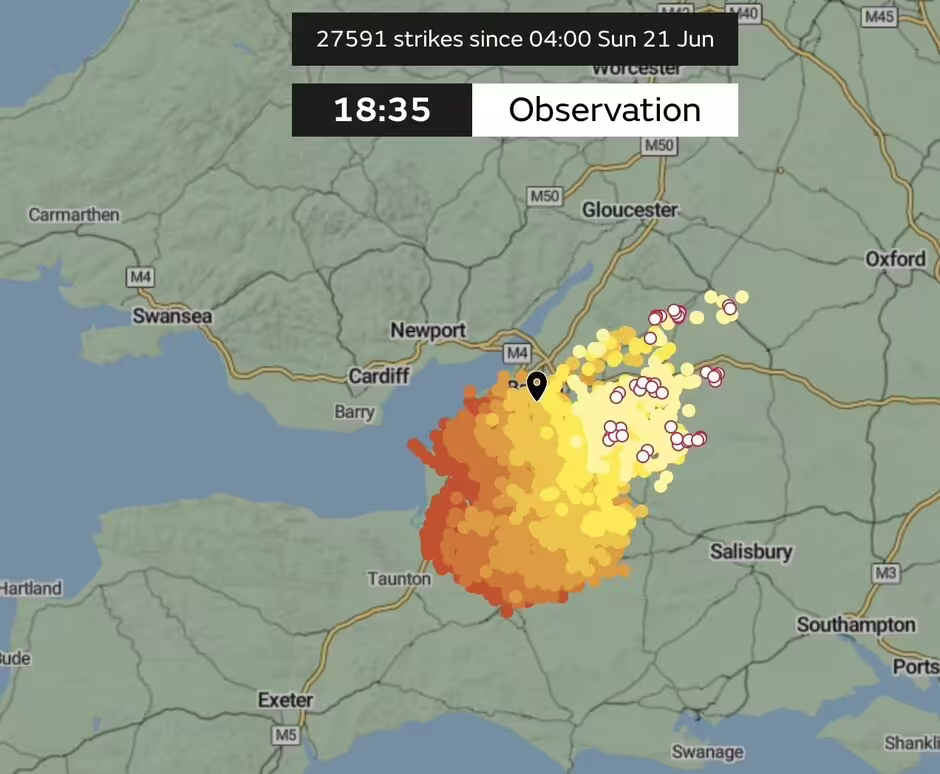 A Met Office infographic showing lots of red, orange, yellow, and cream dots over Bristol and the Southwest, representing lightening strike density. 
