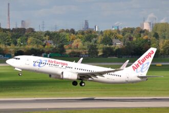Air Europa B737-800 EC-IDT taking off from runway