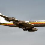 A Uganda Airlines Boeing 707-351C in the airline’s iconic black, yellow and red livery descends for landing. The image highlights the carrier’s aviation heritage as Uganda Airlines embarks on a new era of fleet expansion with Boeing aircraft.