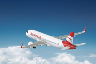 Austrian Airlines airbus A320neo flying over the clouds