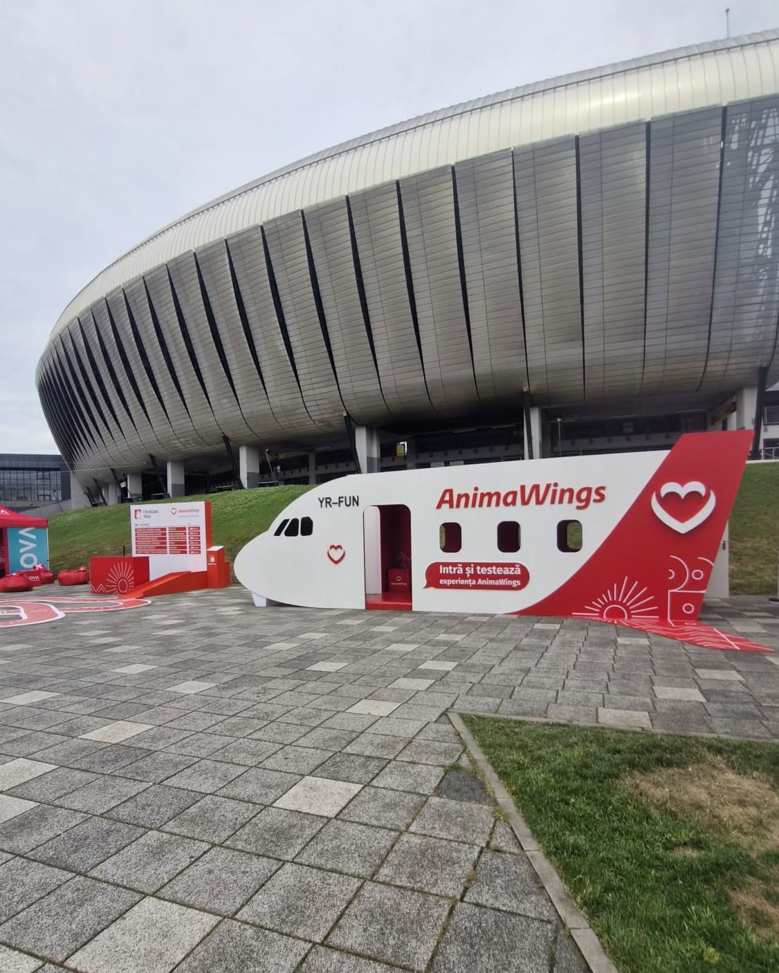 AnimaWings booth featuring a red and white cardboard aeroplane within Sports Festival 2026