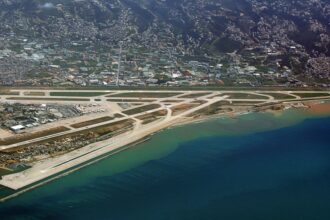 An aerial view of the runway meeting the sea at Beirut–Rafic Hariri International Airport