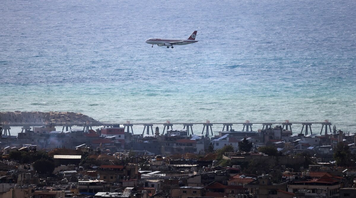 Middle East Airlines aircraft approaches Beirut-Rafic Hariri International Airport, flying over Beirut’s southern suburbs
