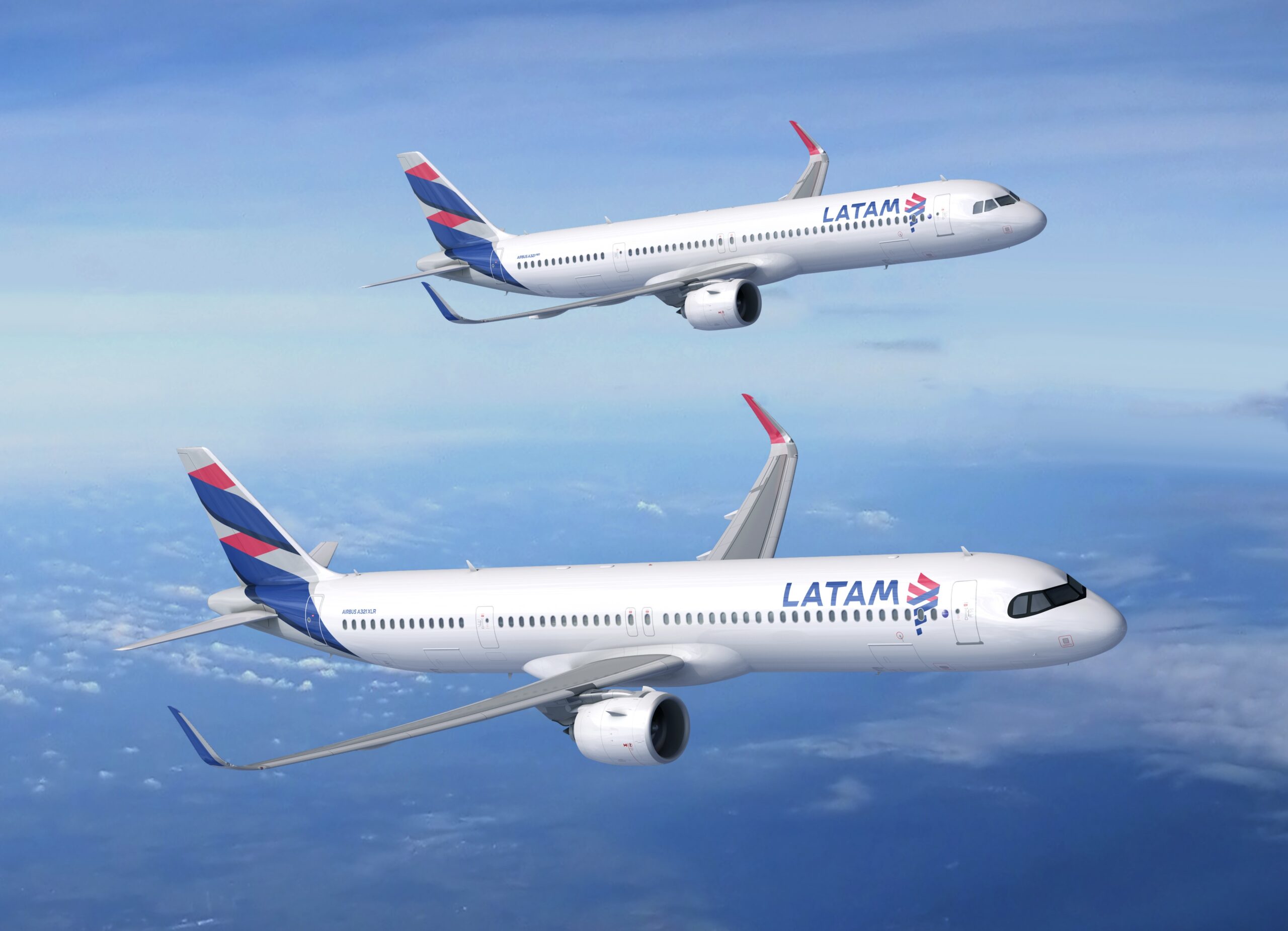 Two LATAM airlines jets in a clear sky.