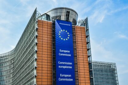 The EU Commission’s Berlaymont building in Brussels, with a European Commission banner hanging from the top.