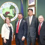 Joann DiGennaro, President of CEE; Todd Young, U.S. Senator and CEE Honorary Trustee; Walter Cho, Chairman and CEO of Korean Air and Hanjin Group; and Mel Chaskin, Chairman of the CEE Board of Trustees, pose for a commemorative photo at the signing ceremony.