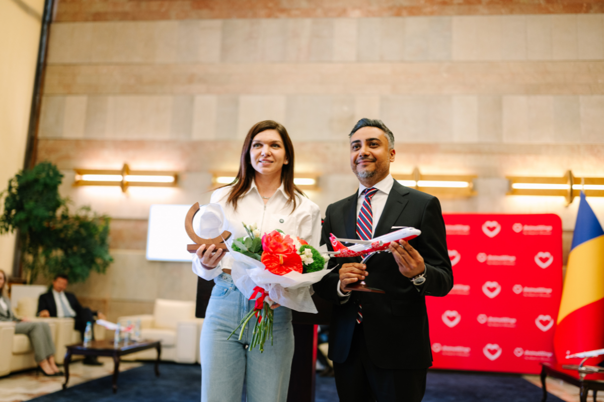 Simona Halep, on the left, with Marius Pandel, CEO and Co-Founder of AnimaWings, on the right