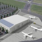 Image shows concept of Bristol Airport's proposed aircraft maintenance hangar with three aircraft parked nearby