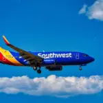 A Southwest Airlines Boeing 737 flying on blue sky