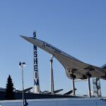 An Air France Concorde aircraft at Technik Museum Sinsheim, Baden-Württemberg, Germany. The long and bizarrely pointed aircraft is elevated on columns for display.