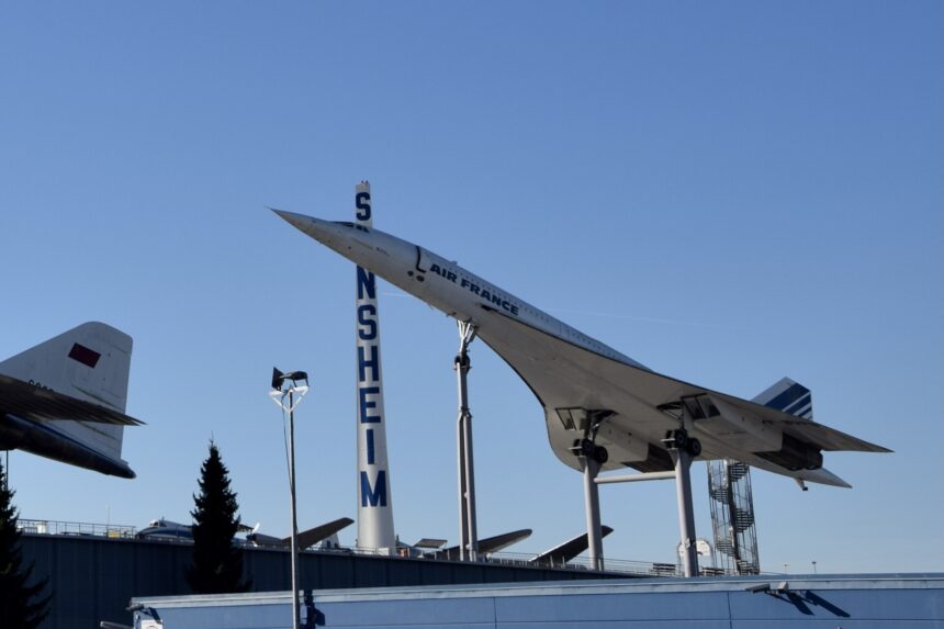 An Air France Concorde aircraft at Technik Museum Sinsheim, Baden-Württemberg, Germany. The long and bizarrely pointed aircraft is elevated on columns for display.