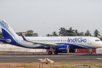 An IndiGo Airbus A320neo taxis along the runway at Mumbai Airport in the airline's distinctive blue-and-white livery. The fuel-efficient narrowbody aircraft, powered by next-generation engines, is preparing for departure on one of the carrier's domestic or international routes