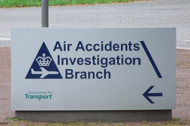 A white sign that reads "Air Accidents Investigation Branch" in dark blue.