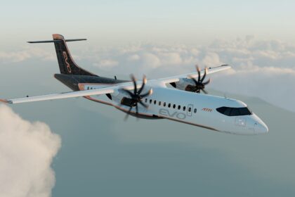 An ATR EVO turboprop aircraft in flight above clouds, showing its twin-engine design and livery.