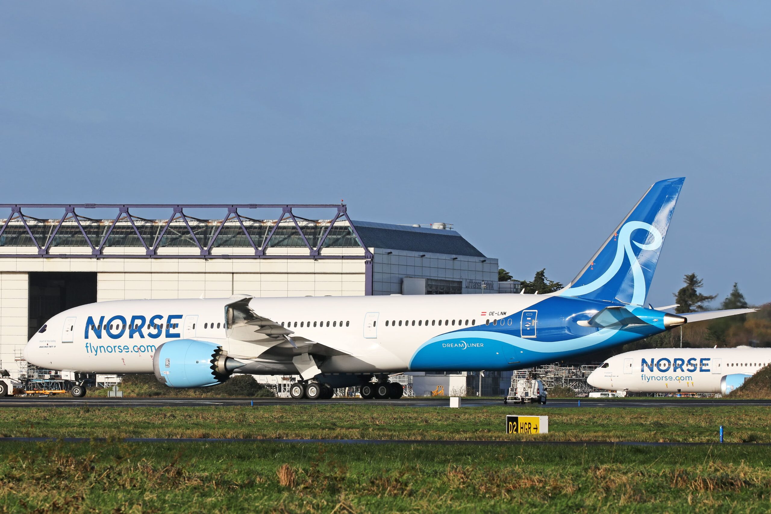 Norse Atlantic Boeing 787-9 Dreamliner registration OE-LNM parked on tarmac, with a second Norse aircraft visible in the background.
