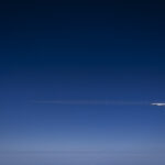 Image shows two Gulfstream 800 aircraft in a dark sky.