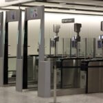 The eGates at Heathrow Airport. Three in a row with the facial recognition technology seen.