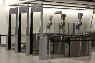 The eGates at Heathrow Airport. Three in a row with the facial recognition technology seen.