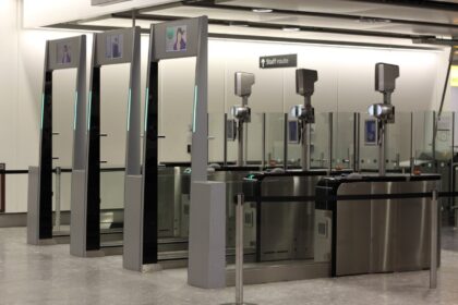 The eGates at Heathrow Airport. Three in a row with the facial recognition technology seen.