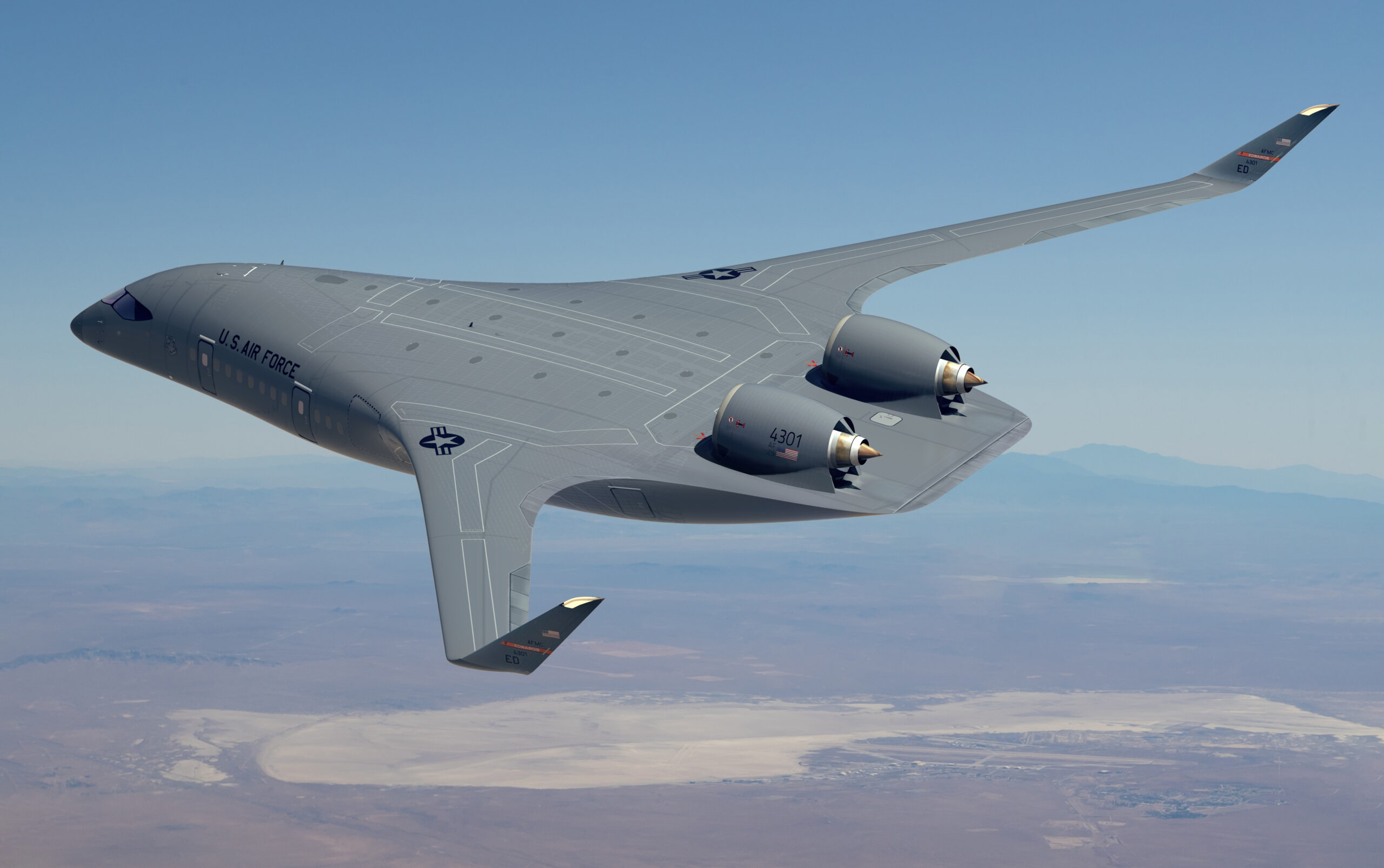 A grey JetZero concept jet flying over an open landscape, in front of a clear sky.