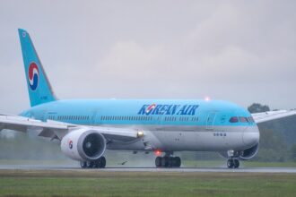 An image of an Korean Air aircraft touching down in Vancouver Canada
