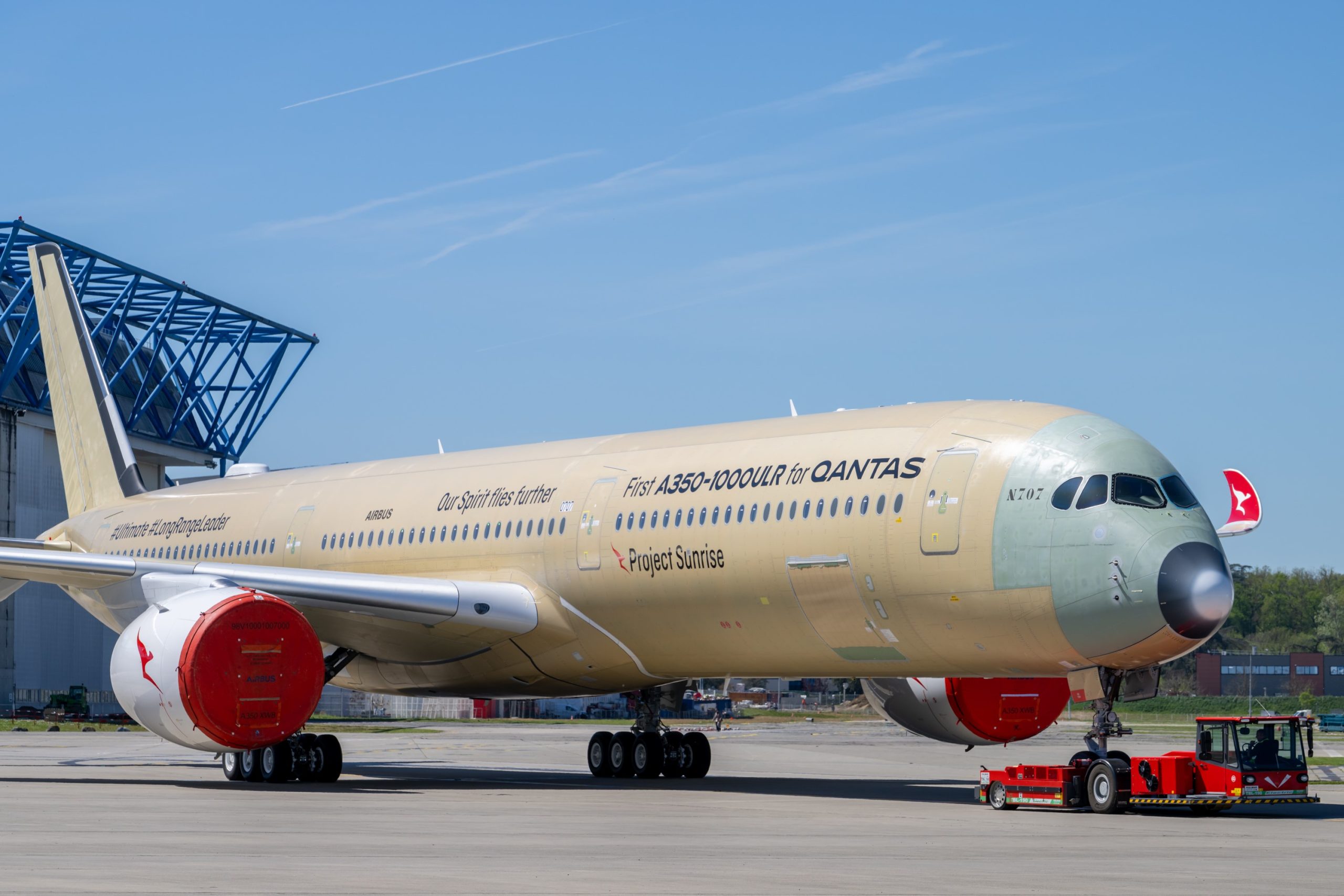 Project sunrise Airbus A350-1000ULR at the airport donning golden colours as it is being tested and worked on by engineers