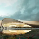 Architectural rendering of Navi Mumbai International Airport's terminal building with a lotus pond in the foreground.