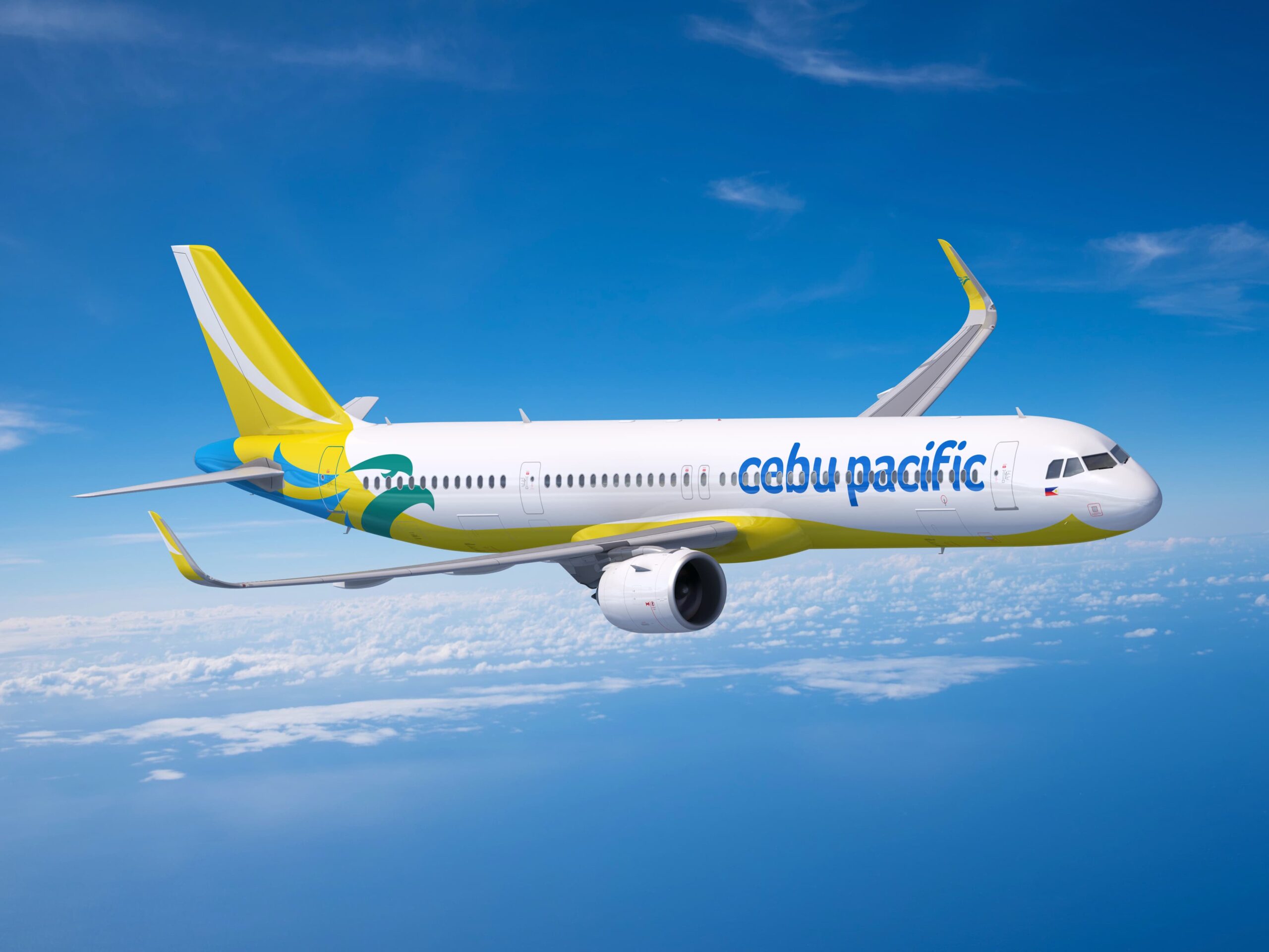 Cebu Pacific Airbus A321-neo aircraft flying above the clouds side view