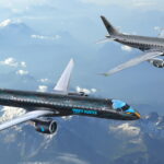 two black Embraer aircraft flying side by side above the clouds